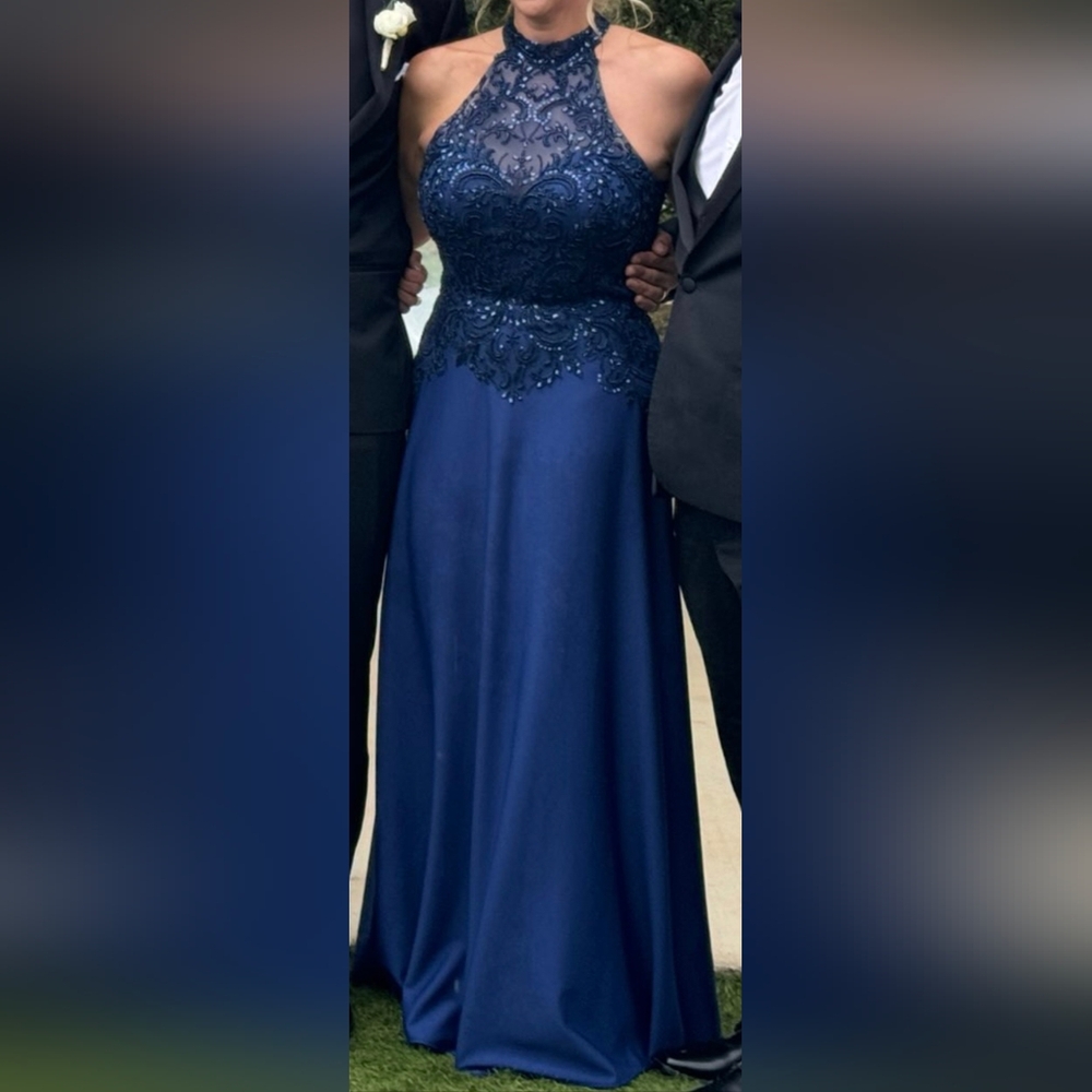 Elegant navy gown with detailed Bodice and Flowing Skirt